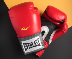 Should you clench your fist in boxing gloves?