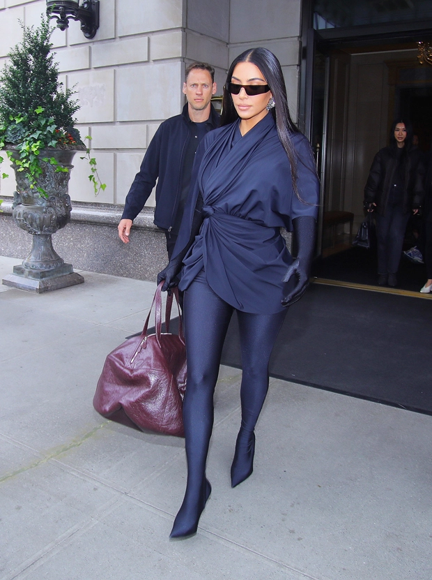 kim wearing leather gloves